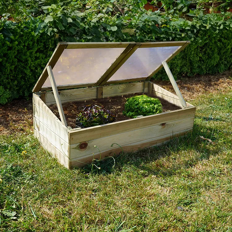 Couche en bois pour semis et jeunes plants utilisée au potager pour protéger du froid et favoriser la croissance
